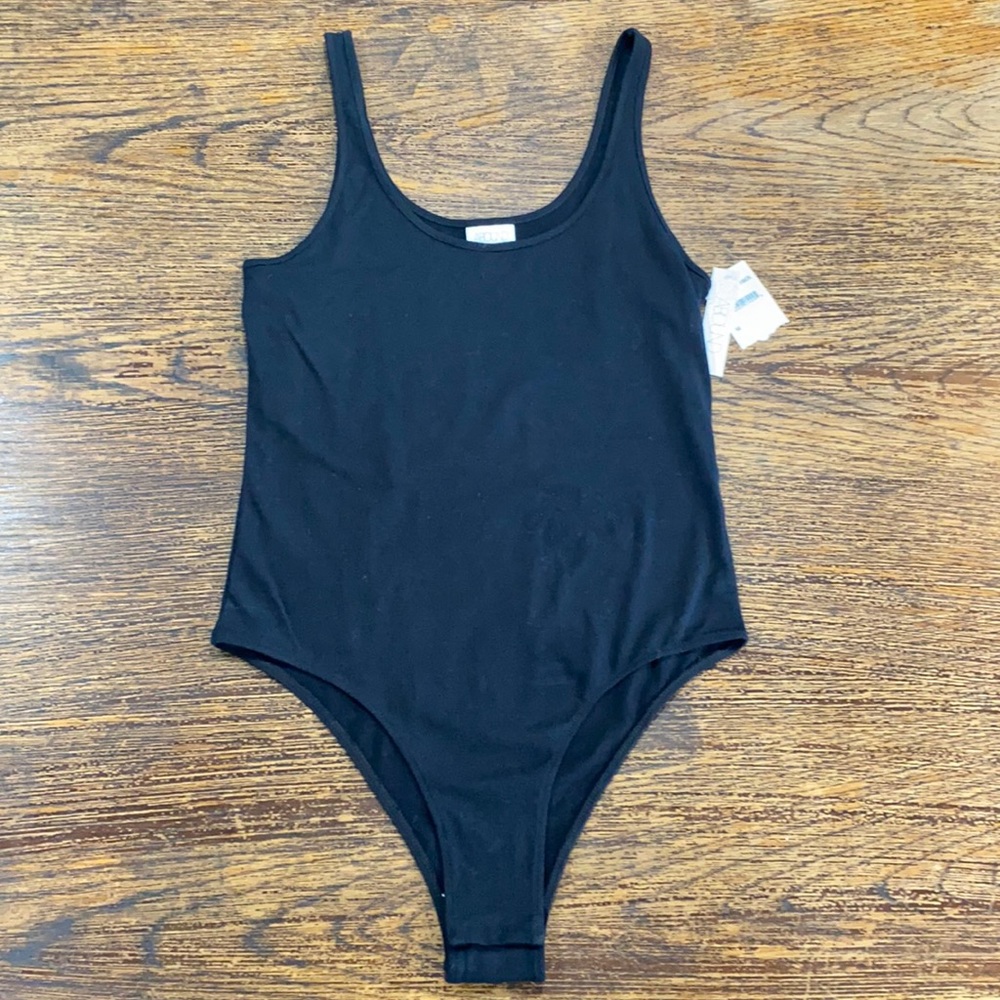Abound Woman’s Body Suit Medium New
